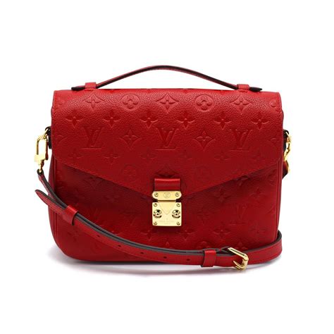 red louis vuitton bag.